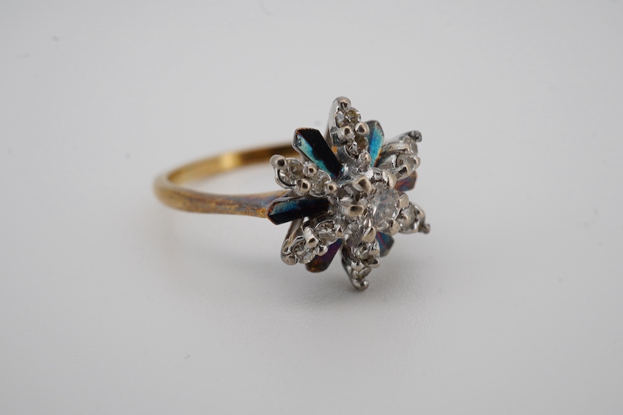 A Victorian 15ct gold, turquoise and seed pearl set marquise shaped ring, size N, together with an 18ct and diamond cluster set flower head ring, with 'coloured' petals, size O, gross weight 6.1 grams. Condition - fair